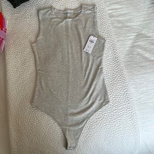 NWT Gray cotton body suit